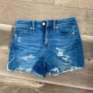Distressed denim shorts